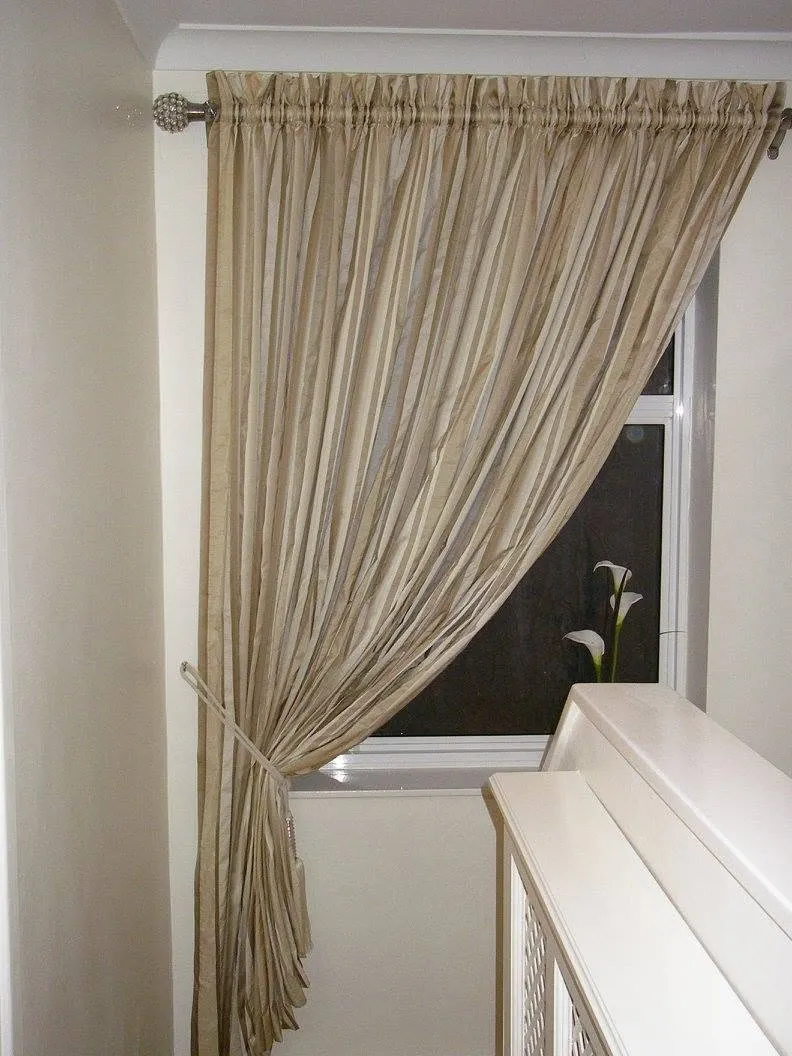 Hand-finished cream pinch-pleat curtain panel