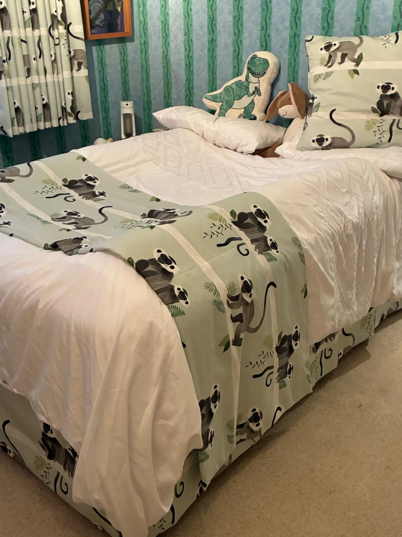 Child’s bedroom with matching handmade curtains, bed runner and cushion